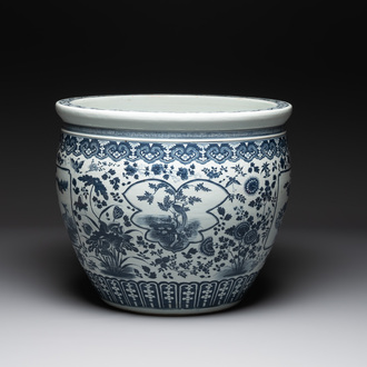 A large Chinese blue and white fish bowl with birds, deer, insects and flowering branches, 19th C.