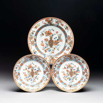 A Chinese famille rose 'antiquities' dish and two plates, Yongzheng/Qianlong