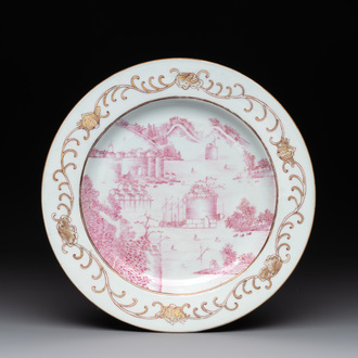 A Chinese puce-enamelled and gilt-decorated 'harbour scene' plate, Qianlong