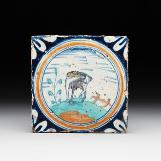 A polychrome Dutch Delft maiolica 'medallion' 'horse' tile, late 16th C.