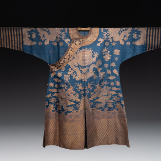 A Chinese embroidered silk blue-ground summer gauze 'nine dragons' robe, 19th C.
