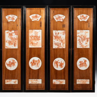 A Chinese four-part folding screen with iron-red-decorated porcelain plaques, 19/20th C.