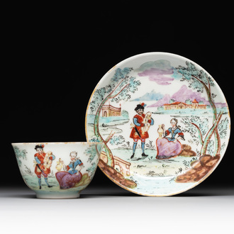 A Dutch-decorated Chinese porcelain cup and saucer with figures in a landscape, 18th C.