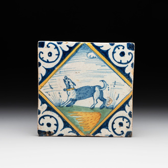 A polychrome Dutch Delft maiolica 'diamond' 'dog' tile, late 16th C.