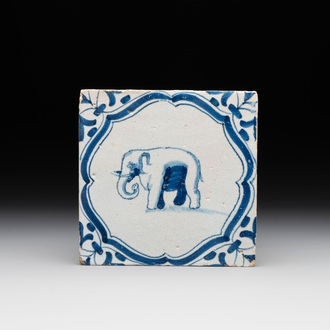 A blue and white Dutch Delft 'accolades border' 'elephant' tile, 17th C.