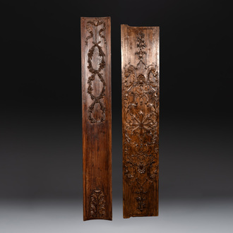 Two ornately carved pine and walnut panels, France, 18th C.