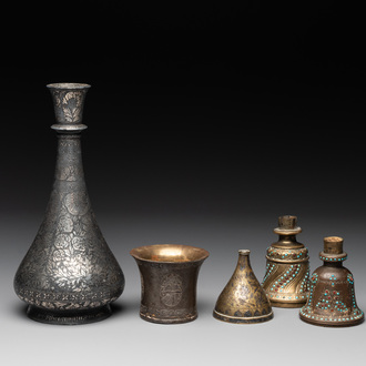 A bidriware vase, a steel hookah cup and three copper alloy hookah mounts, India/Persia, 19th C.