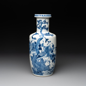 A Chinese blue and white vase with birds among flowering branches, 19th C.
