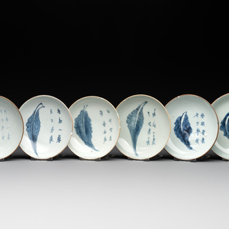 Six Chinese blue and white 'leaf and poem' saucers, Shunzhi