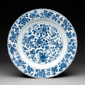 A Chinese blue and white 'four seasons' dish, Kangxi mark and of the period