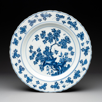 A Chinese blue and white dish with floral design, Kangxi mark and of the period