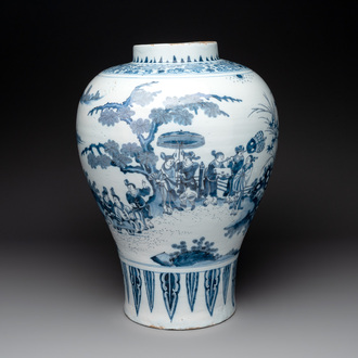 A very large Dutch Delft blue and white chinoiserie baluster vase, last quarter 17th C.