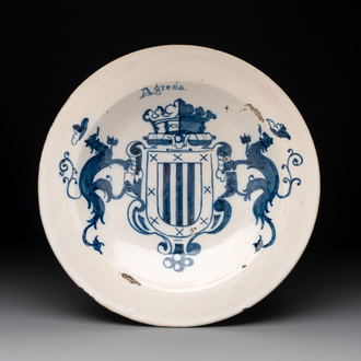 A blue and white Spanish armorial dish with the arms of Agreda, Talavera, 18th C.