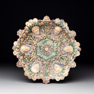 A French polychrome relief-moulded dish in the manner of Palissy, 17th C.