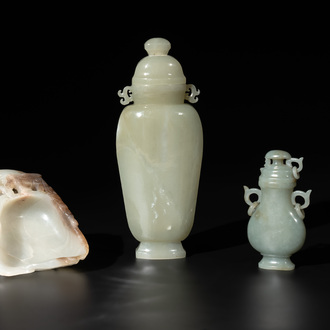 A Chinese white and russet jade lotus-form brush washer and two covered vases, Qing