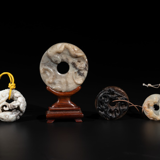 Four Chinese jade 'chilong' 'bi' discs, Ming/Qing