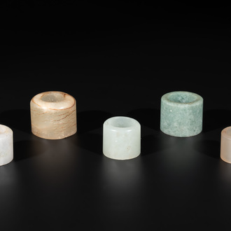Five Chinese jade and agate archer's rings, Qing