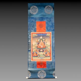 A Tibetan thangka depicting a lama, 19th C.
