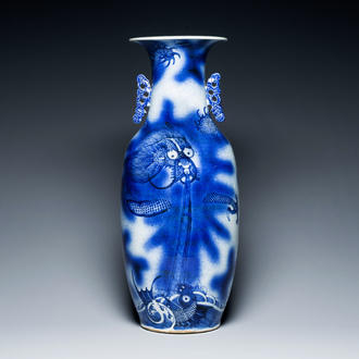 A Chinese blue and white 'dragon and carp' vase, 19th C.