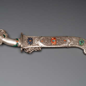 A large Tibetan coral- and precious stone-inlaid silver dagger, 19th C.