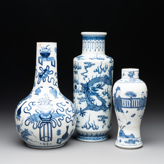 Three Chinese blue and white vases with antiquities, dragons and figures, 19th C.