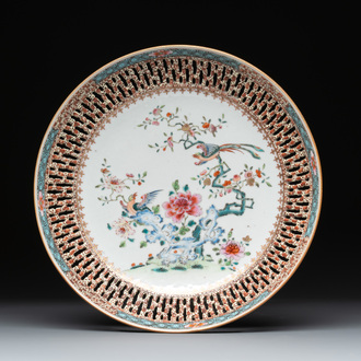 A Chinese famille rose reticulated border 'birds among flowering branches' plate, Qianlong