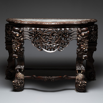 A finely carved Chinese hongmu console table with marble top and mother-of-pearl inlay, Canton, 19th C.