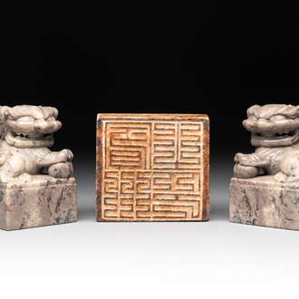 A pair of Chinese grey marble 'lion' seals and a seal, 20th C.