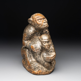 A Chinese stone group of two monkeys, 20th C.