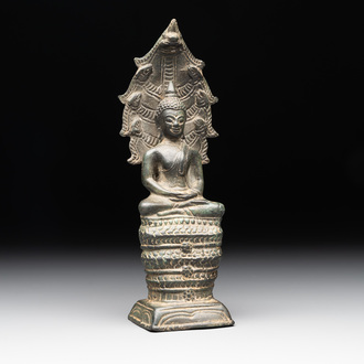 A Khmer bronze figure of Buddha Mucilinda, Angkor period, 12/13th C.
