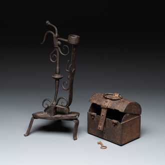 A wrought iron candle holder and a casket, possibly France and Nuremberg, 16/18th C.