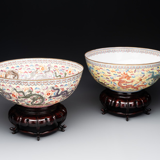 Two Chinese eggshell famille rose 'dragon' bowls on wooden stands, Qianlong mark, 20th C.