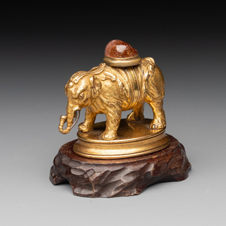 A Chinese pink quartz-inset gilt bronze elephant, 18th C.