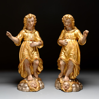 A pair of gilt and polychromed wooden figures of angels, Germany, 18th C.