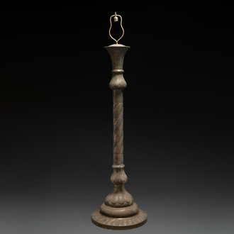 A large reticulated and inscribed brass floor lamp, Qajar, 19th C.