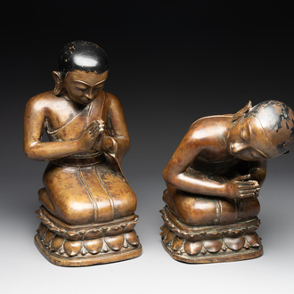 Two Burmese partly lacquered bronze praying monks, 18/19th C.