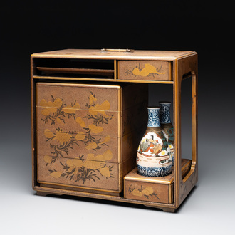 A Japanese lacquerware picnic set with two sake bottles, Meiji, 19th C.