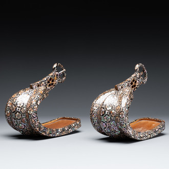 A pair of Japanese lacquered and 'raden' mother-of-pearl-inlaid 'abumi' stirrups, Edo, 18/19th C.