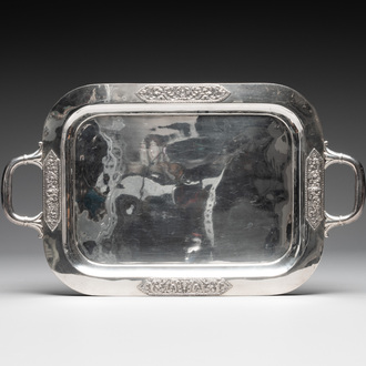A sterling silver tray with two handles, Southeast Asia, 19/20th C.