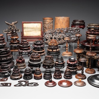 A large collection of 103 Chinese wooden stands, covers and other wood works, 19/20th C.