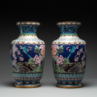 A pair of Chinese cloisonné vases with birds among flowering branches, 20th C.