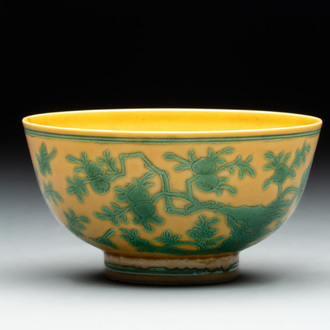 A Chinese yellow-ground 'birds and peaches' bowl, Guangxu mark and possibly of the period