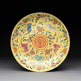A Chinese famille rose yellow-ground 'bats and peaches' plate, Tongzhi mark and of the period