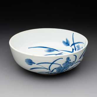 A Japanese Kakiemon-style blue and white 'quails' bowl, 19/20th C.