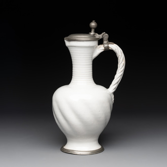 A pewter-mounted white Dutch Delftware jug, 17th C.
