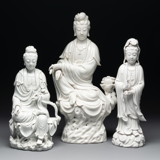 Three Chinese Dehua blanc de Chine figures of Guanyin, 20th C.