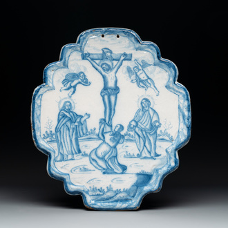 A blue and white Dutch Delft 'Crucifixion' plaque, 18th C.