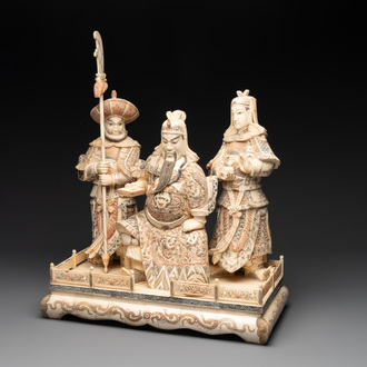 A Chinese bone-veneered group of Guandi and his attendents, 20th C.