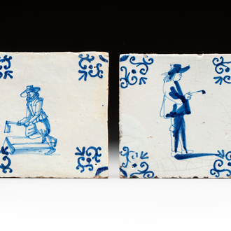 Two blue and white Dutch Delft 'pipe smoker' and 'wood worker' tiles, 17th C.