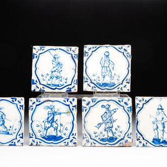 Six blue and white Dutch Delft 'accolade borders' 'soldier' tiles, 17th C.